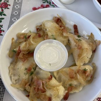 Red Rock Deli - Meat Pirogies fried w butter, onions, & bacon with sour cream - Delis Near Me - Albuquerque, New Mexico