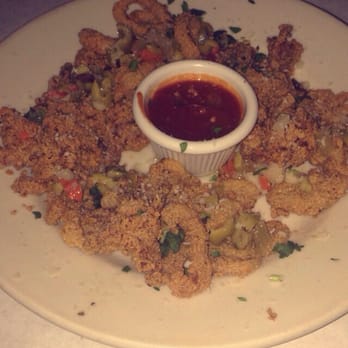 Russo's - Calamari appetizer. Flavorful and tender. - Italian Near Me - Peninsula, Ohio Russo's - Calamari appetizer. Flavorful and tender. - Italian Near Me - Peninsula, Ohio
