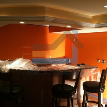 Nbf Painting - a kitchen with orange walls - Painters Near Me - Leesburg, Virginia Nbf Painting - a kitchen with orange walls - Painters Near Me - Leesburg, Virginia