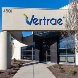 Kamal R Woods, MD MBA - Vertrae - Outside main entrance of Vertrae® spinal care facility