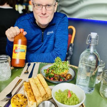 Nourish Bistro - Smashed avo, v(egg)ie bowl, and hot sauce - Vegan Near Me - Banff, Alberta