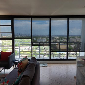 ECO Shades - Living Room w/ Shades Half Down - Shades & Blinds Near Me ECO Shades - Living Room w/ Shades Half Down - Shades & Blinds Near Me