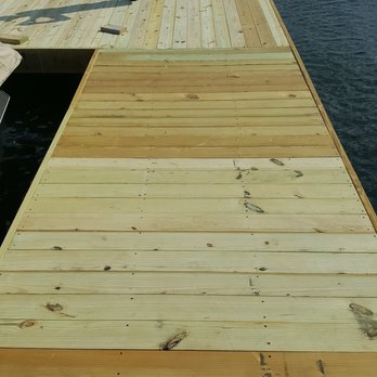 B & N Construction - a man standing on a dock - General Contractors Near Me B & N Construction - a man standing on a dock - General Contractors Near Me