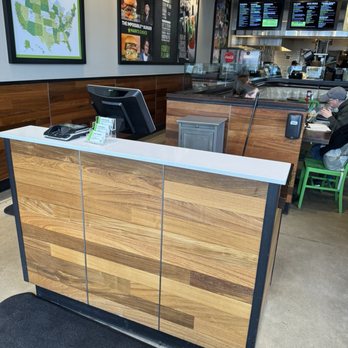 Wahlburgers - Unmanned hostess stand. - Burgers Near Me - Lynnfield, Massachusetts