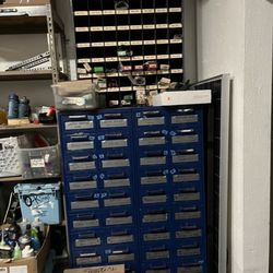 Spokes and parts organized into a nice cabinet with deep pull out drawers
