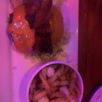 Thomas Street Warehouse - Burger no bun, overcooked - fries. You pay extra for poutine as a side but they don't include bacon but don't tell you that - Bars Near Me - Seattle, Washington