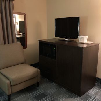 Quality Inn - TV hutch for the sitting place includes a microwave and a larger than average refrigerator - Hotels Near Me - Madras, Oregon Quality Inn - TV hutch for the sitting place includes a microwave and a larger than average refrigerator - Hotels Near Me - Madras, Oregon