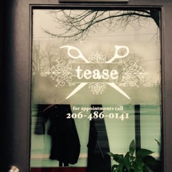Tease - Entrance to Tease! Next door to Smitty's Barber Shop.