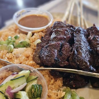 Thai Original BBQ - Beef satay. The Cucumber side dish is so refreshing. - Thai Near Me - Glendale, California Thai Original BBQ - Beef satay. The Cucumber side dish is so refreshing. - Thai Near Me - Glendale, California