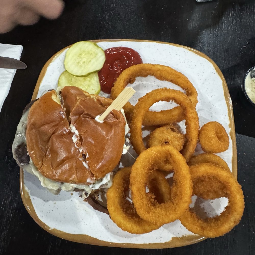 Smokey’s Mountain Bar & Grill - Wild mushroom and Swiss waygu smashburger and onion rings. - Beer Bar Near Me - Spruce, Michigan Smokey’s Mountain Bar & Grill - Wild mushroom and Swiss waygu smashburger and onion rings. - Beer Bar Near Me - Spruce, Michigan