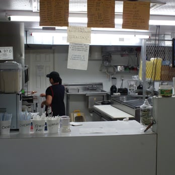 El Milagro - a woman in a restaurant kitchen - Grocery Near Me - Elkin, North Carolina El Milagro - a woman in a restaurant kitchen - Grocery Near Me - Elkin, North Carolina