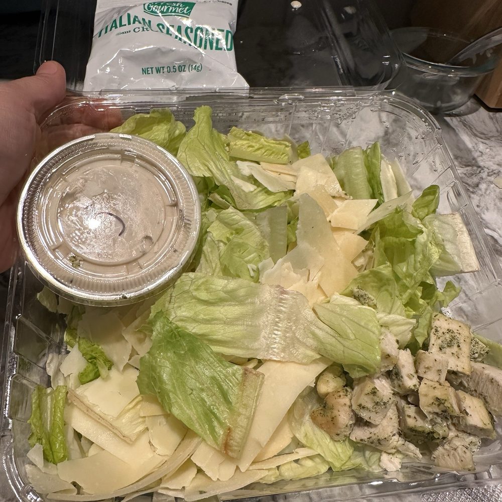 Welted lettuce and cold refrigerated chix caeser salad Welted lettuce and cold refrigerated chix caeser salad