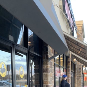 Buffalo Wild Wings - Lady worker at adjacent business to restaurant smoking cigarets every 5 minutes making patrons have to smell the disgusting habit. - American Near Me - Plano, Texas