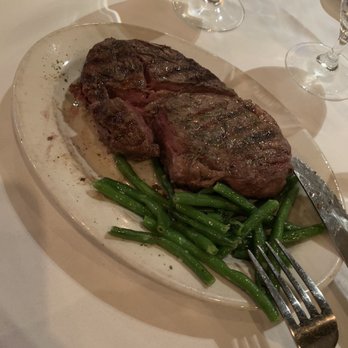 Myron's Prime Steakhouse - Ribeye steak medium rare and green beans - Steakhouses Near Me - San Antonio, Texas Myron's Prime Steakhouse - Ribeye steak medium rare and green beans - Steakhouses Near Me - San Antonio, Texas