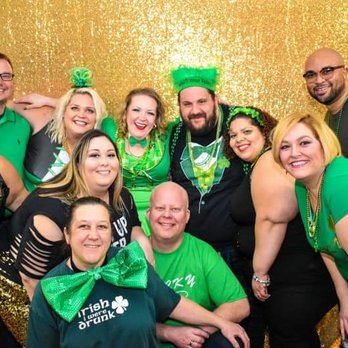 Living Large Chicago - a group of people dressed in green - Nightlife Near Me - Northbrook, Illinois Living Large Chicago - a group of people dressed in green - Nightlife Near Me - Northbrook, Illinois