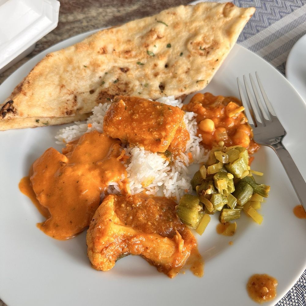 Garlic naan, chicken tikka masala, aloo gobi, channa masala, bindi, fish curry. Garlic naan, chicken tikka masala, aloo gobi, channa masala, bindi, fish curry.
