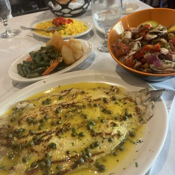 Tapas De España - Trout in lemon capers, seafood salad - Spanish Near Me - North Bergen, New Jersey Tapas De España - Trout in lemon capers, seafood salad - Spanish Near Me - North Bergen, New Jersey