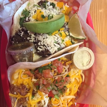Torchy's Tacos - The Deomocrat w/ Mangos (top) and Trailer Park "Trashy" (bottom) - Tex-Mex Near Me - Round Rock, Texas Torchy's Tacos - The Deomocrat w/ Mangos (top) and Trailer Park "Trashy" (bottom) - Tex-Mex Near Me - Round Rock, Texas