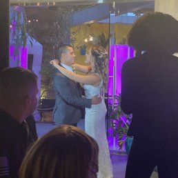 First dance & DJ special lighting kit in background. First dance & DJ special lighting kit in background.