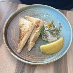 Waxholms Hotell - The view is beautiful, the staff is very helpful and so courteous! We had the salmon salad, shrimp, and local beer-delicious!