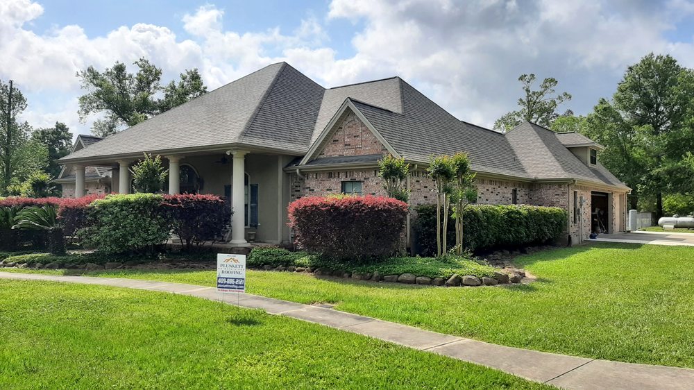 Slide of Plunkett Roofing