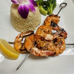 Yummy Gyro - Grilled shrimp souvlaki with rice.