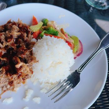 Naupaka Terrace - a plate of food on a table - Hawaiian Near Me - Lihue, Hawaii Naupaka Terrace - a plate of food on a table - Hawaiian Near Me - Lihue, Hawaii