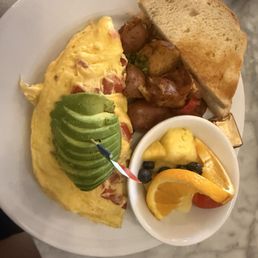 Parisian omelette either potatoes and fruit Parisian omelette either potatoes and fruit