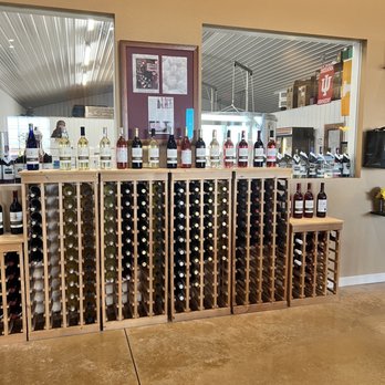 Tonne Winery - rows of wine bottles in a wine cellar - Wineries Near Me - Muncie, Indiana Tonne Winery - rows of wine bottles in a wine cellar - Wineries Near Me - Muncie, Indiana