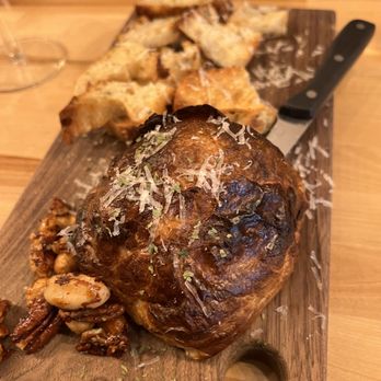 Ripple Wine Bar O'Bryonville - a steak on a cutting board - Wine Bars Near Me - Cincinnati, Ohio