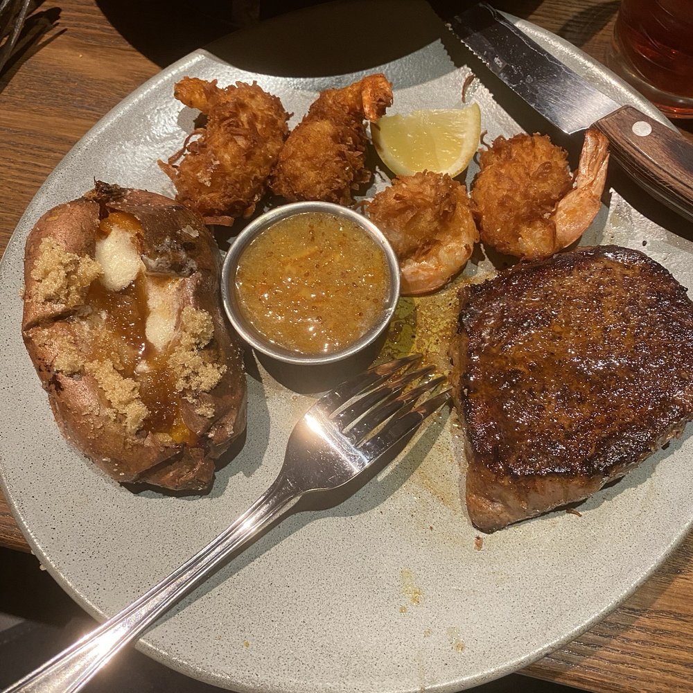 Outback Steakhouse - 6oz Victoria's Filet Mignon* & Lobster; what was supposed to be lobster they actually put the coconut shrimp I ordered with sweet potato - Steakhouses Near Me - Wesley Chapel, Florida Outback Steakhouse - 6oz Victoria's Filet Mignon* & Lobster; what was supposed to be lobster they actually put the coconut shrimp I ordered with sweet potato - Steakhouses Near Me - Wesley Chapel, Florida