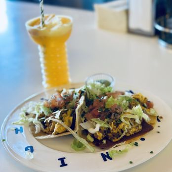 Beginner's Diner - BREAKFAST TACOS SUPREME" flour tortillas, soyrizo and eggs, cheddar choose, sour cream, tomato, chives - Diners Near Me - San Diego, California