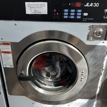The Art Laundrette - Machine with our big load of laundry. - Laundromat Near Me - Glasgow, GLG The Art Laundrette - Machine with our big load of laundry. - Laundromat Near Me - Glasgow, GLG