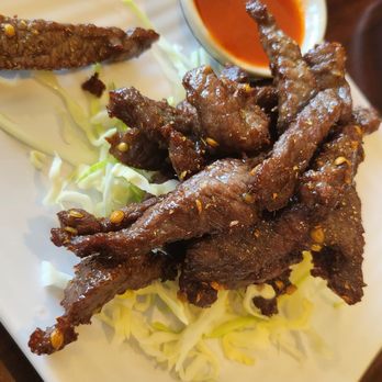 Chiang Mai - Nua Sawaan / Marinated Coriander Beef Strips - Thai Near Me - Webster Groves, Missouri Chiang Mai - Nua Sawaan / Marinated Coriander Beef Strips - Thai Near Me - Webster Groves, Missouri
