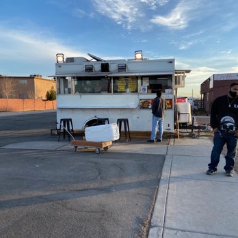Tacos De Barbacoa - a man standing in front of a food truck - Tacos Near Me - Las Vegas, Nevada Tacos De Barbacoa - a man standing in front of a food truck - Tacos Near Me - Las Vegas, Nevada