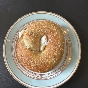 Off Center Bagels - Roasted garlic & rosemary bagel with plan cream cheese - Bagels Near Me - Reno, Nevada Off Center Bagels - Roasted garlic & rosemary bagel with plan cream cheese - Bagels Near Me - Reno, Nevada