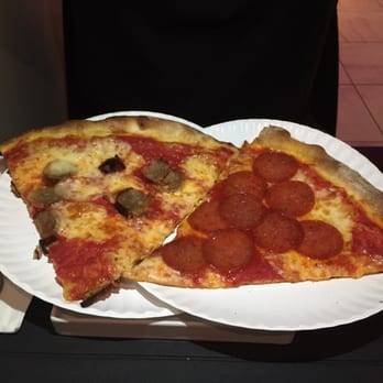 Baggios Pizza - Sausage and pepperoni on the left, Pepperoni on the right - Pizza Near Me - Fort Lee, New Jersey Baggios Pizza - Sausage and pepperoni on the left, Pepperoni on the right - Pizza Near Me - Fort Lee, New Jersey