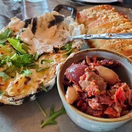 Hot artichoke dip with bread. Hot artichoke dip with bread.