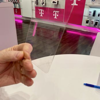 T-Mobile - My husband holding the cracked screen protector - Mobile Phones Near Me - Sunnyvale, California