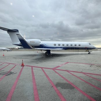 Signature Aviation - an airplane on the tarmac - Airport Terminals Near Me - Chicago, Illinois