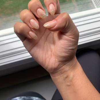LaBella Nails & Spa - Ombré glitter nails with a nude color Almond shape - Massage Near Me - New York, New York LaBella Nails & Spa - Ombré glitter nails with a nude color Almond shape - Massage Near Me - New York, New York