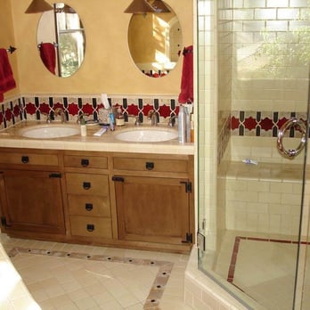 Watts Specialties - a bathroom with two sinks and a shower - General Contractors Near Me Watts Specialties - a bathroom with two sinks and a shower - General Contractors Near Me
