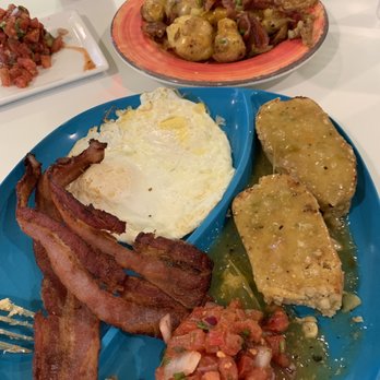 The Local - We split 2 eggs, bacon, and tamales.   Side of potatoes. - American Near Me - Prescott, Arizona