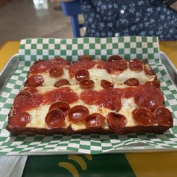 Pepperoni Detroit style pizza with ranch