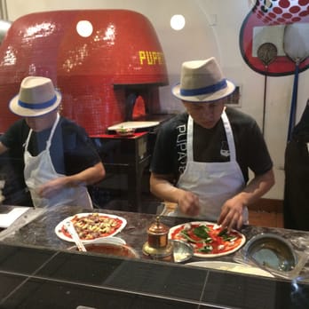 Pupatella - Hard at work- they are super efficient! - Pizza Near Me - Arlington, Virginia Pupatella - Hard at work- they are super efficient! - Pizza Near Me - Arlington, Virginia
