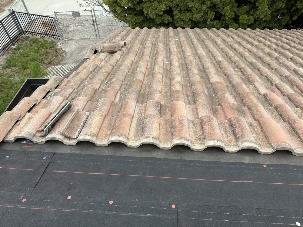 Slide of OMC Roofing