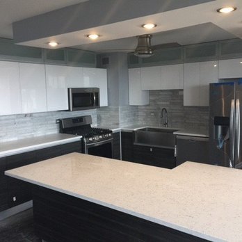 T-N-D Construction - ows a kitchen with stainless steel appliances - General Contractors Near Me - Chicago, Illinois T-N-D Construction - ows a kitchen with stainless steel appliances - General Contractors Near Me - Chicago, Illinois