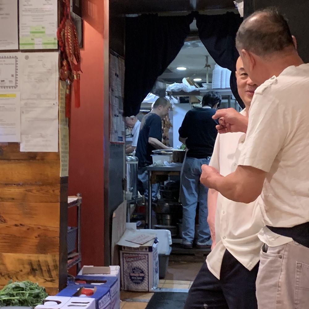 Wing's Kitchen - View of the extremely active cook staff - Chinese Near Me - Boston, Massachusetts Wing's Kitchen - View of the extremely active cook staff - Chinese Near Me - Boston, Massachusetts