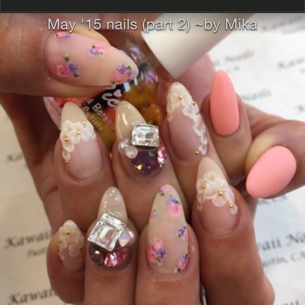Kawaii Nails - This is the art..The flowers on thumb and middle finger but on me I wanted them on 4 nails and the matte peach on the rest - Nail Salons Near Me - Newport Beach, California