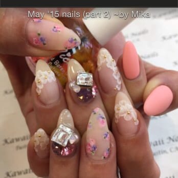 Kawaii Nails - This is the art..The flowers on thumb and middle finger but on me I wanted them on 4 nails and the matte peach on the rest - Nail Salons Near Me - Newport Beach, California Kawaii Nails - This is the art..The flowers on thumb and middle finger but on me I wanted them on 4 nails and the matte peach on the rest - Nail Salons Near Me - Newport Beach, California